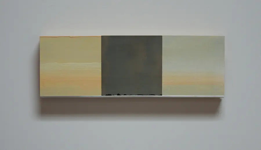 Paintings with different shades of orange and grey